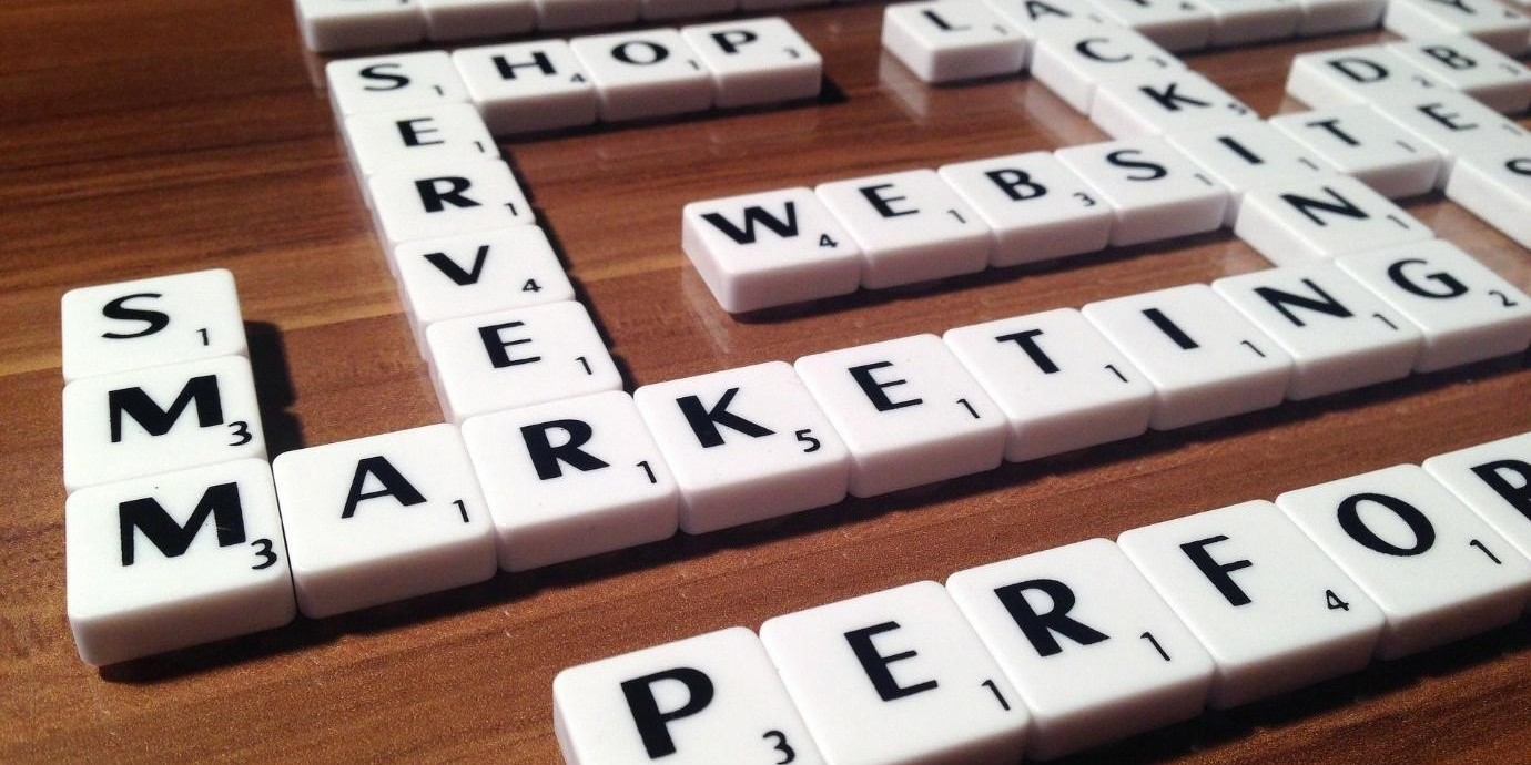 A desk covered in Scrabble words