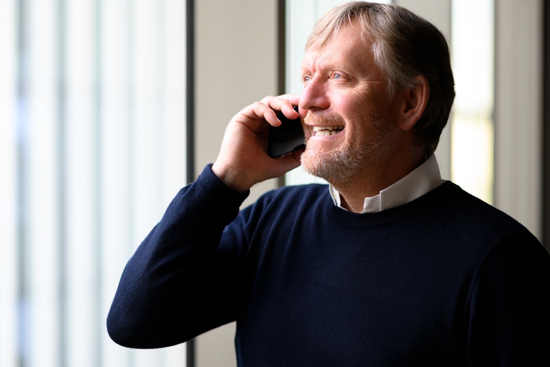 An Itseeze consultant takes a call from a client